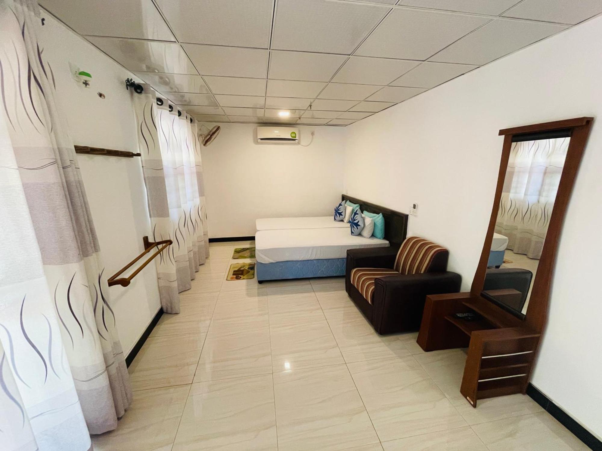 Tishan Holiday Resort Polonnaruwa Rum bild