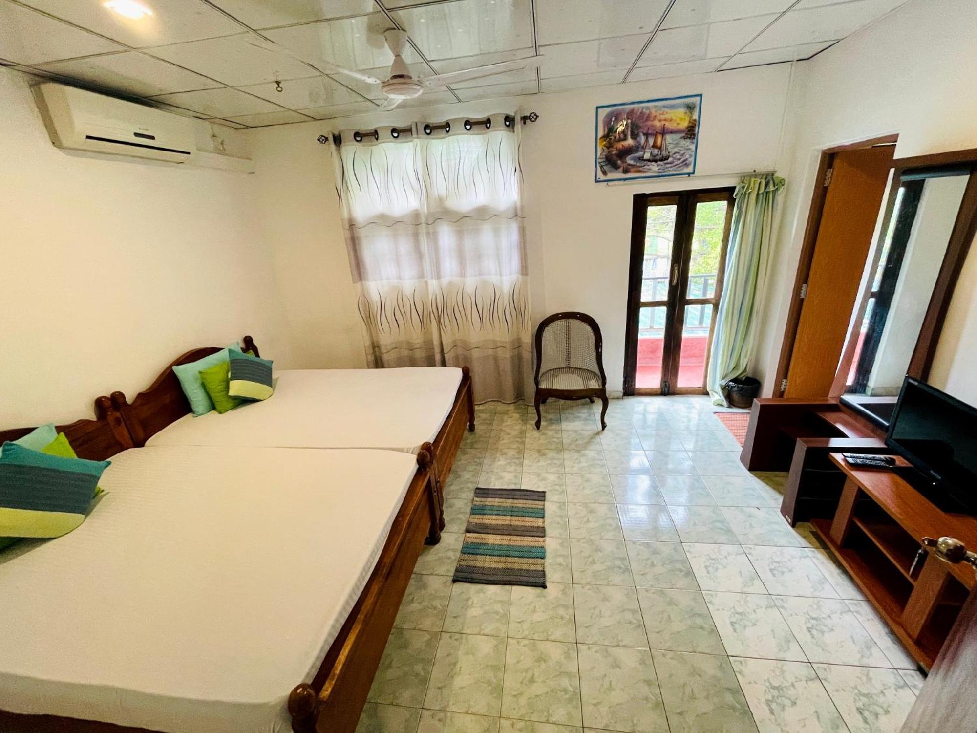 Tishan Holiday Resort Polonnaruwa Rum bild